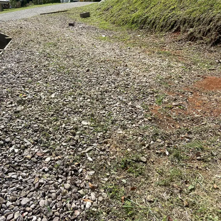 After: weedy gravel driveway edge cleaned up, Yandina